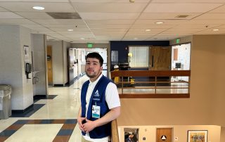 AHS volunteer poses at San Leandro Hospital.
