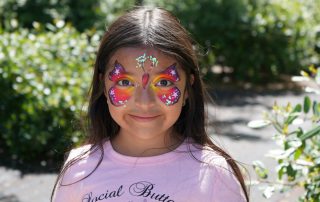 Child smiling with facepaint