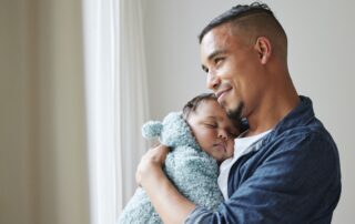 Father holding a baby